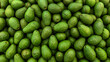 © erna - Fresh Green Avocados Pile Healthy Organic Fruit Food Background