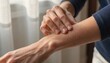 © ng-TDRD - Close-up of a person's arm showing goosebumps, indicating a cold or emotional reaction, with a blurred curtain background.