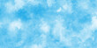 © MD SAGOR - Bright painted sky blue watercolor background, Abstract blue sky with clouds,Aquarelle paint paper textured canvas element for text design. vector pastel color paint stain. Blue watercolor background,