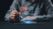 © Hassan - Professional person using a digital stylus to interact with a glowing virtual alert status interface