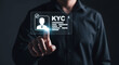 © Nasima88 - Businessman touching KYC virtual screen for know your customer identity verification