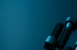 © Fahroni - Metal bolts on blue background. Hardware tools. Closeup hex head bolt and socket cap bolt with copy space. Threaded fastener use in automotive engineering. Hexagonal bolt. High strength fasten bolt.