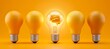© Home Stock - Illuminated light bulb with a glowing brain inside, surrounded by unlit orange bulbs, symbolizing creativity and a bright idea