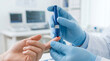 © Janna - Female Nurse Measuring Patient Blood Sugar Level, Medical Diagnostics