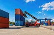 © Studio - Reach stacker lifting blue cargo container at busy port terminal under bright blue sky, global logistics and maritime shipping industry concept