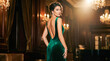 © Celt Studio - gorgeous elegant fashion model wearing luxurious glamorous emerald green velvet evening gown standing inside wealthy classic interior room featuring sparkling golden crystal chandeliers