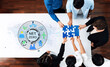 © InfiniteFlow - Diverse Group Collaborating to Solve Net Zero Challenges with Puzzle Pieces on Table in Modern Office Environment. Entropy.