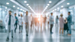 © CStock - Blurred image of healthcare professionals in a busy hospital corridor, showcasing teamwork and patient care dynamics.