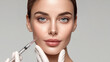 © Atchariya63 - Cosmetic filler facial injection woman syringe beauty treatment skincare close up portrait of woman during cosmetic filler facial injection with