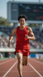 © PMBYTK - Powerful male runner achieving victory at the finish line during an intense track event