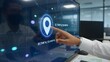 © Mdraza - Anonymous professional in a sharp suit touching a glowing blue digital location pin icon on a virtual map interface, representing global logistics, GPS navigation, and advanced business tracking.