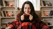 © Николай Срибяник - Young woman relaxing with warm mulled wine in cozy home interior.