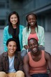 © Iryna - Group of young diverse friends smiling outdoors on campus