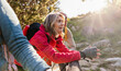 © AresStudio Belen y Carlos/Stocksy - Senior woman hiking enjoying sunny outdoor adventure in nature