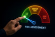 © Md Ikbal - A person touching a digital risk assessment gauge screen showing a green low risk level with glowing colorful light effects on a dark background