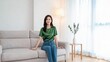 © 渊 李 - Woman sitting on sofa in living room