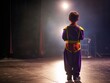 © Can Berkol - child performer under stage lights
