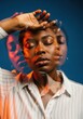 © Ariestia - Artistic Portrait of a Young Black Woman with Motion Blur Effect Representing Mental Health and Inner Conflict