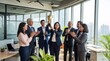 © PixelCorp.ai - Diverse Indian corporate team celebrating success with a golden trophy in a modern office, showcasing teamwork, employee recognition, leadership, workplace achievement, and professional business