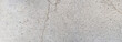 © Arbaz - Weathered concrete texture with cracks, industrial gray cement wall background, rustic stone surface for architectural design and overlays