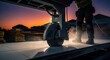 © DEWI - Construction Worker Precises Cutting Material At Dusk Golden Hour Glow