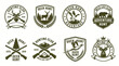 © achmad - Set of vintage round hunting badges featuring deer silhouettes and rustic insignia for outdoor enthusiasts