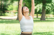 © buritora - A female yoga instructor conducts yoga, yoga classes, and Pilates in parks and forests.