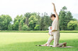© buritora - Baby yoga, parent-child yoga, moms, mothers, young Asian women (Gate Pose)