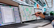 © Andrey Popov - Experienced Urban Planner Analyzes City Maps And Land Data