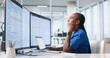 © Andrey Popov - Young Female Healthcare Worker Uses Laptop