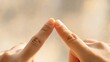 © LUMEN - Two fingers touching each other in soft focus, symbolizing connection and unity