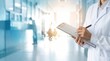 © MediaStockPro - Doctor in white coat writing notes on clipboard in bright hospital corridor, medical professional at work, healthcare administration, patient care documentation