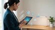 © Olivia - Woman using tablet with blockchain chain links, smart contract shield and cryptocurrency symbols, depicting decentralized finance, secure transactions and digital asset management