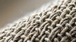 © bayu - Macro close-up of natural woven rope texture with shallow depth of field, showcasing intricate details of the beige and brown fibers in a rustic and organic pattern.