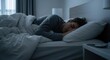 © Aulia - Young Man Sleeping Peacefully In His Comfortable Bed At Night