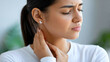 © Nataliya - Close-up of a faceless young woman scratching an itchy, red rash on her neck, skin irritation from insect bites, dermatitis or food and drug allergies, dry skin health concept,