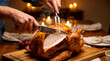 © Rahmat Chowdhury - Roasted turkey being sliced on a wooden cutting board at dinner table