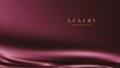 © Thishan - Premium burgundy abstract background featuring flowing silk textures, soft metallic highlights, and sophisticated luxury aesthetics. Ideal for branding, packaging, fashion, beauty, upscale marketing