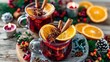 © mashimara - Cozy Christmas mulled wine with orange slices and cinnamon sticks