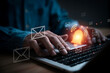 © Dilok - Email notification and alert concept on laptop computer with glowing bell icon and message symbols. Digital communication, inbox management, email marketing, business alerts and online messaging.