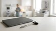 © world - Closed laptop and medical reflex hammer on desk in hospital background