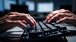 © MohammadFhazran - Hands Typing on Illuminated Computer Keyboard in Dark Room