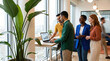 © ADDICTIVE STOCK - Team reviewing business data and growth plan in modern office