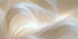 © kaungthatsan - Abstract elegant flowing white silk texture with soft 3D waves and warm glowing light background