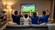 © Agnes - Excited family fans celebrating soccer goal in dimly lit modern living room with wide angle cinematic shot for digital streaming services promotion