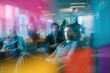 © backup_studio - Man sitting in a modern office behind a glass partition with colorful reflections. Business meeting atmosphere and professional communication. Corporate environment and teamwork concept.