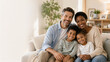 © SalmanStock - Happy Multiracial Family Relaxing Together At Home Portrait Showing Love Connection Parenting Happiness And Modern Family Lifestyle