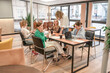© svetograph - Business women collaboration meeting discussing strategy in modern office