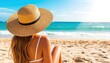 © Андрей Григорьев - Stylish Woman Sitting on Beach Facing the Ocean