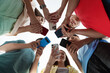 © New Africa - Group of teenagers with different smartphones indoors, bottom view